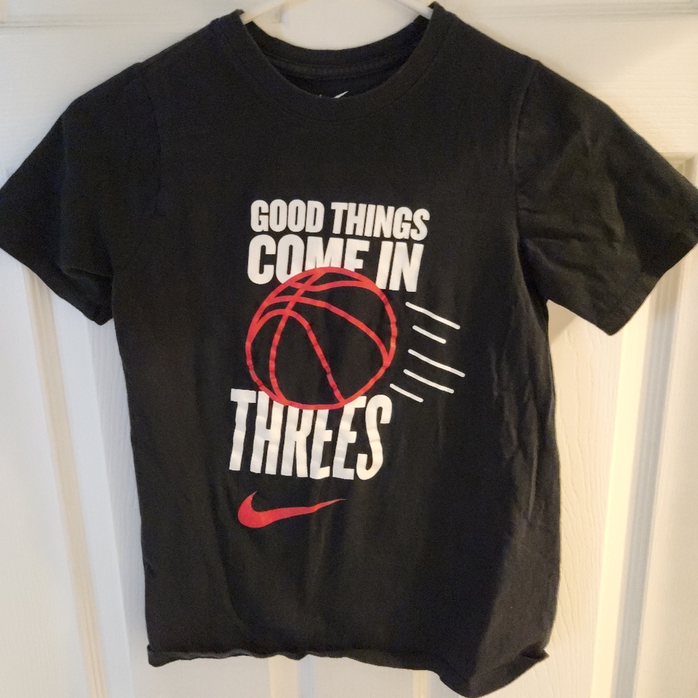 The nike tee youth shirt size M Athletic cut